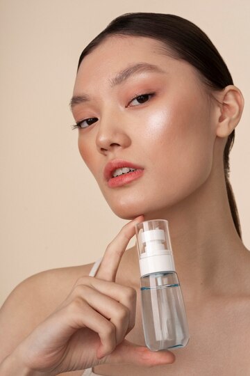 medium-shot-korean-woman-holding-serum_23-2150167652
